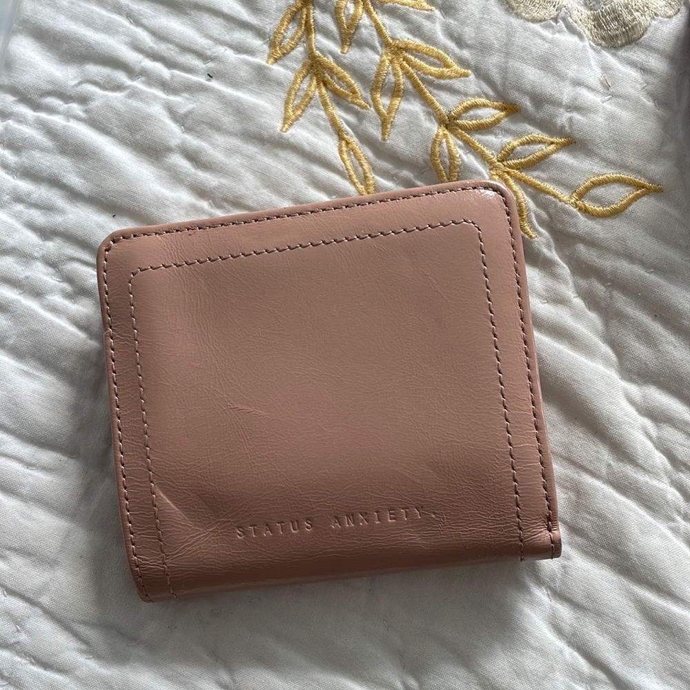 Status anxiety leather wallet